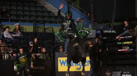 Daylon Swearingen riding a bull at the Tucson Unleash The Beast PBR. 