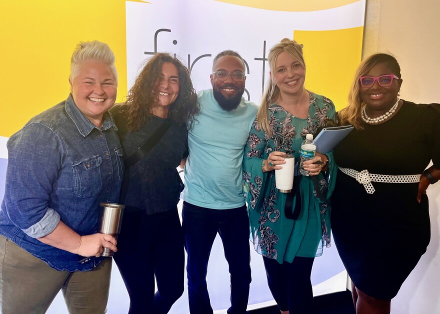 First Coast Connect host Al Letson poses with today's panel. From left are Rebekah Bell, Melissa Hirschman, Amy Love and Brandy Durham.