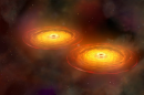 This illustration shows a stage in the merger of two galaxies that forms a single galaxy with two centrally located supermassive black holes surrounded by disks of hot gas. The black holes orbit each other for hundreds of millions of years before they merge to form a single supermassive black hole that sends out intense gravitational waves.