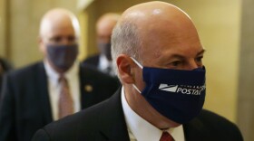 U.S. Postmaster General Louis DeJoy arrives at an Aug. 5 meeting at the office of House Speaker Nancy Pelosi.