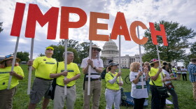 Activists rally for the impeachment of President Donald Trump at the Capitol in Washington, Thursday, Sept. 26, 2019. 