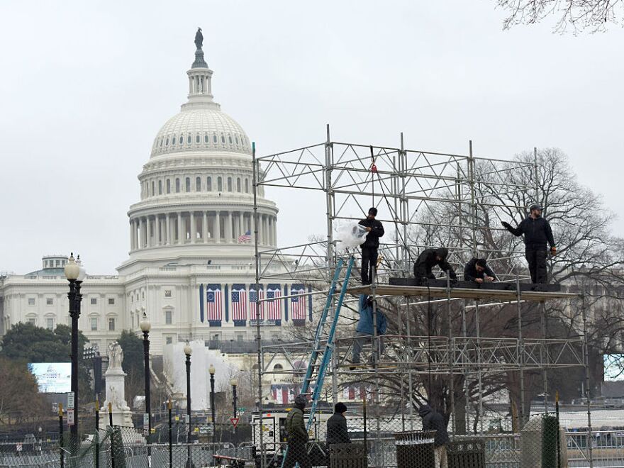 Workers prep a stage for the inauguration of Donald Trump on Capitol Hill on Jan. 17.