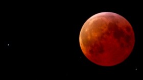 This is a photo of a total lunar eclipse in 2007, as viewed from the nation of Macedonia. North and Central America will be in the best position to view tonight's total eclipse.