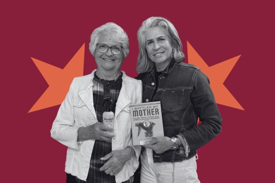 Monica Nassif holds up her book and Thelma Meyer holds up a Mrs. Meyer's product. 