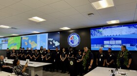 Maui Emergency Management Agency staff, led by administrator Amos Lonokailua-Hewett pictured at the podium, gathered on July 24 for a blessing of the new Emergency Operations Center that will open next month.