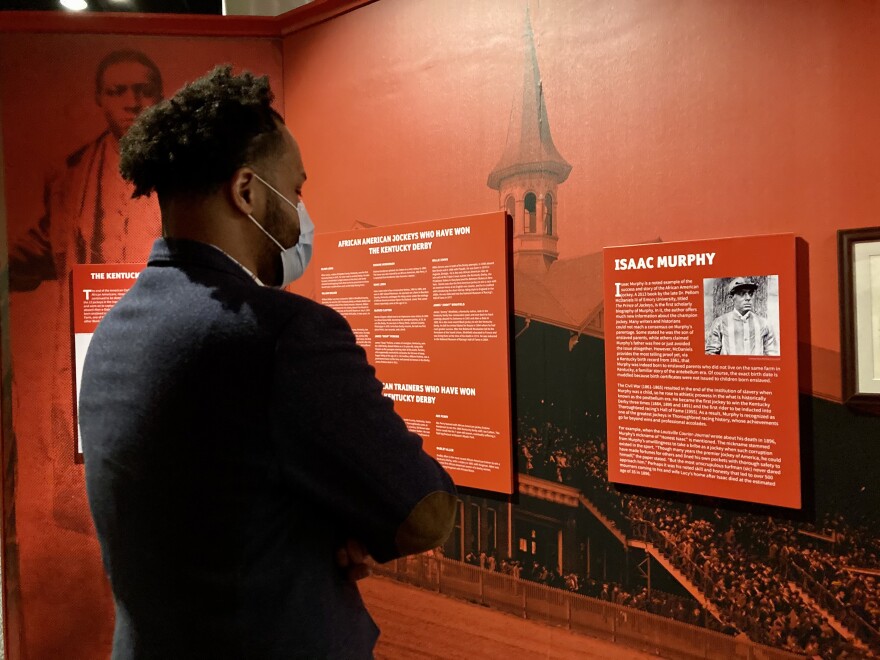 Horse trainer Mark Simms toured the Kentucky Derby Museum's expanded Black Heritage in Racing exhibit.