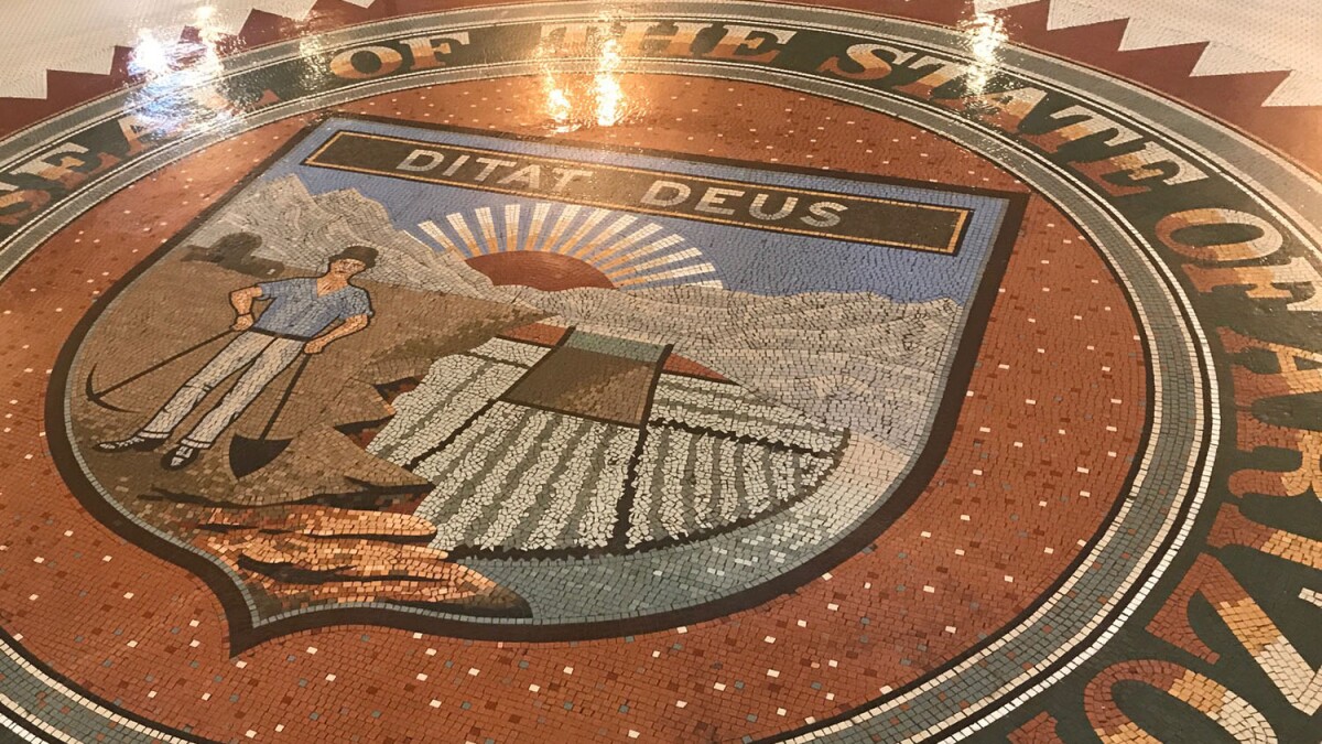 'Ditat Deus' is Arizona's state motto. Where it came from and how it influences government today