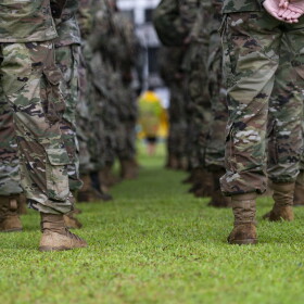 FILE - Airmen assigned to the 36th Wing stand in formation before the start of Guam's 78th Annual Liberation Day parade in Hagatna, Guam, July 21, 2022. (U.S. Air Force photo by Staff Sgt. Suzie Plotnikov)