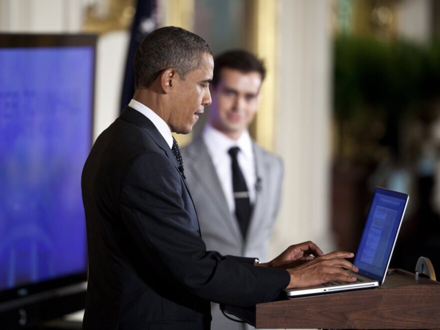 As Twitter co-founder Jack Dorsey looked on, President Obama sent the first presidential tweet at the start of the town hall.