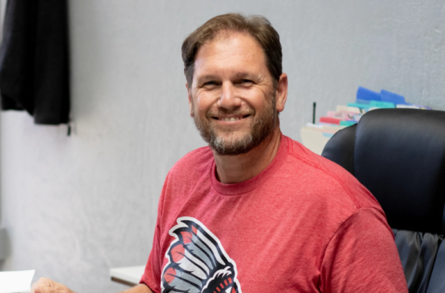 Superintendent and principal Jason Midkiff sits at his desk at Whitebead Public Schools. Midkiff met with the school board on Monday to find a solution to keep serving students meals at the end of the school day.