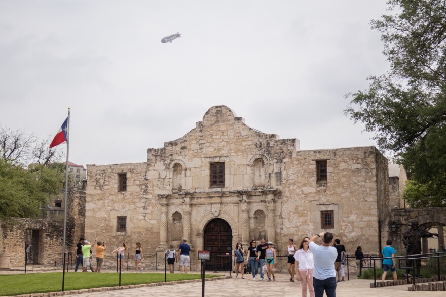 Game sponsor blimp flies over downtown on April 3, 2025
