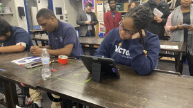 Students at Victory College Prep, a school on the southeast side of Indianapolis, use tablets for a digital art class.