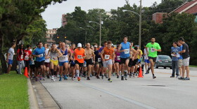 About 150 runners take off from the Project Haiti 5K race starting line Saturday morning on at the University of Florida campus on Gale Lemerand Drive