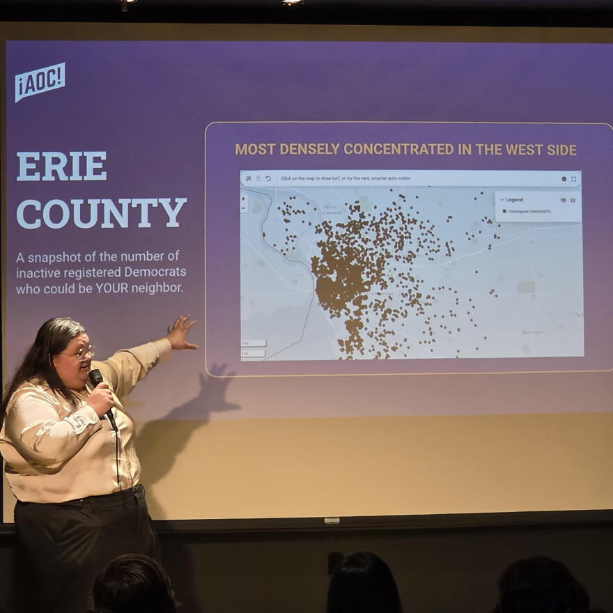 Bronx political activist Destiny Cruz shows a map of inactive registered Democrats in Buffalo.