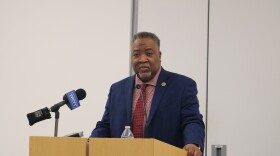 Former Fayette County Public Schools executive director of financial accounting Rodney Jackson speaks with media July 20, 2026, at the Marksbury Family Branch Library in Lexington during a news conference he called to announce pending legal action regarding the ongoing school district budget crisis.