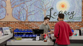 Jordyn Zembrowski, retail agent at Major Bloom, sells a recreational cannabis product to a customer. Adult-use cannabis has been available for sale in Massachusetts since 2018.