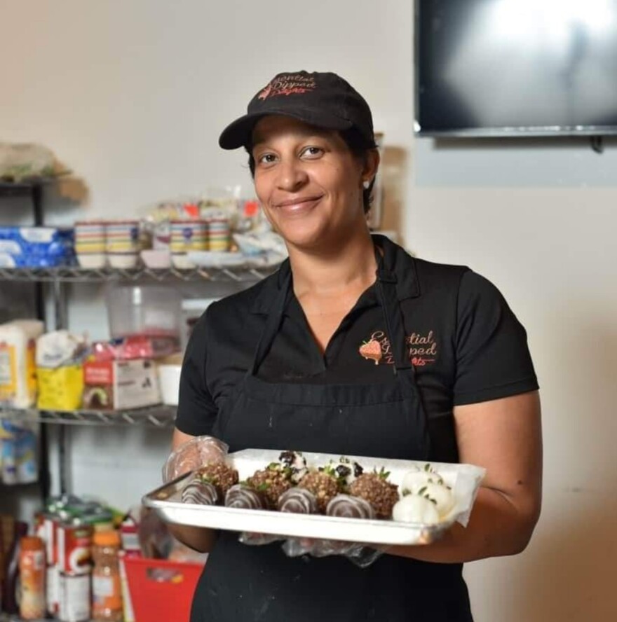 Takila, owner of Essential Dipped Delights, says foot traffic at Northside Market might have been heavier this weekend if not for coronavirus. But the pandemic did not seem to keep people away, either.