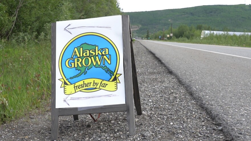 A sign on the side of the road that reads "Alaska Grown" - courtesy of John Whipple, Alaska Division of Agriculture