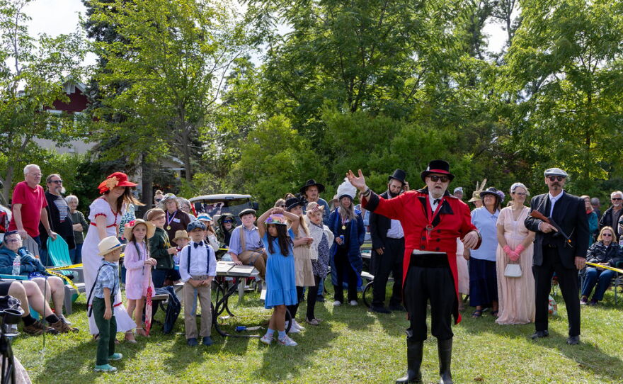 Harrisville community members dressed up to celebrate the opening of the 100-year-old safe.