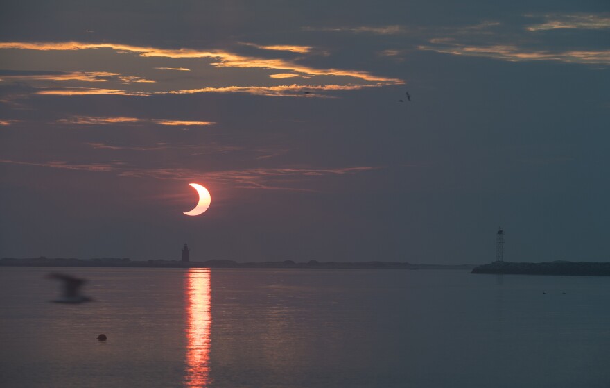 In 2021, a partial solar eclipse is visible in Lewes, Del. This Saturday, people in the Southern Hemisphere will get a chance to glimpse the phenomenon.