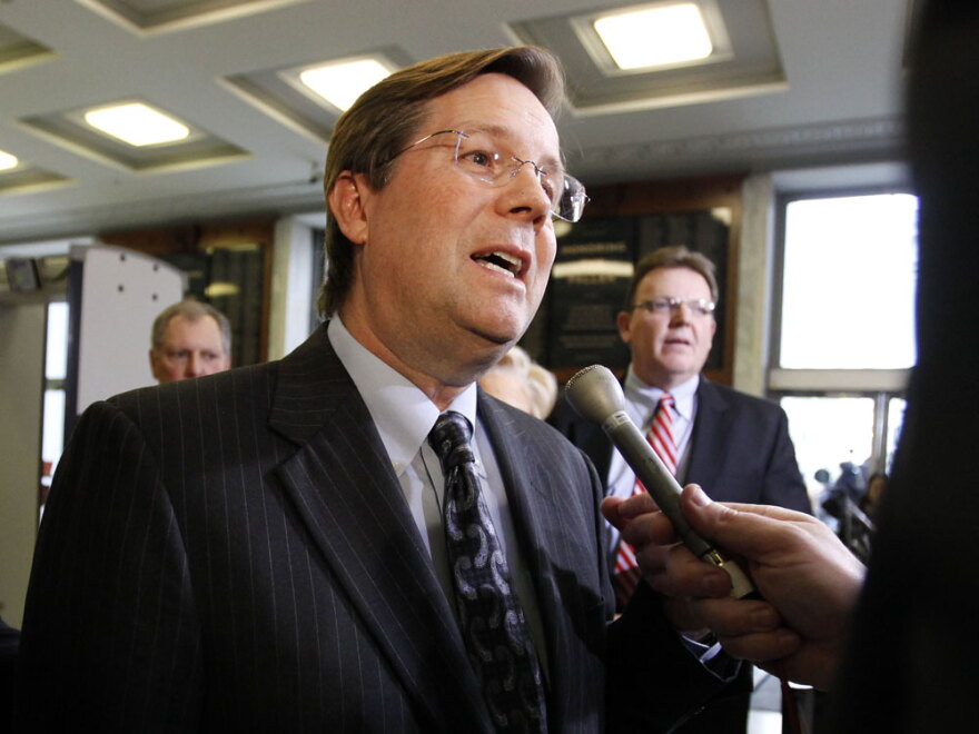 James E. Lentz, head of Toyota Motor Sales USA, talks to the media before testifying at Tuesday's House Oversight and Investigations Subcommittee hearing.