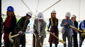 Beth-El Center Executive Director Jennifer Paradis (4th from left) joins officials “as they break ground” during a ceremony on October 19, 2026 celebrating the forthcoming construction of the Beth-El Center n Milford.