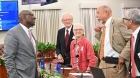 Pictured: Coral World owners Neil and Gertrude Pryor look on as counsel, George Dudley speaks with Senate President Novelle Francis Jr.