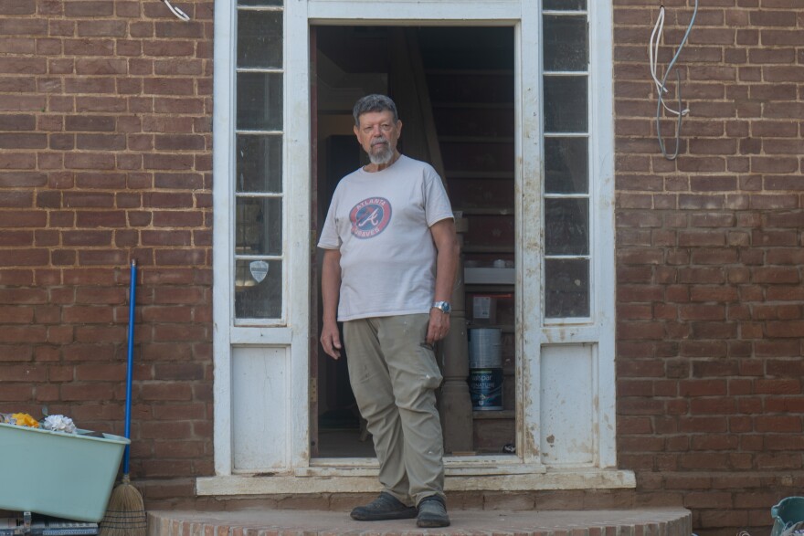 Frank Brough stands on the front porch of his Mosheim, Tenn. home on Tuesday, Sep. 23, 2025. The historic house was built by a nephew of George Washington and grandson-in-law of John Sevier in 1846, and was destroyed when Hurricane Helene caused record-shattering flooding on the Nolichucky River in Greene County.