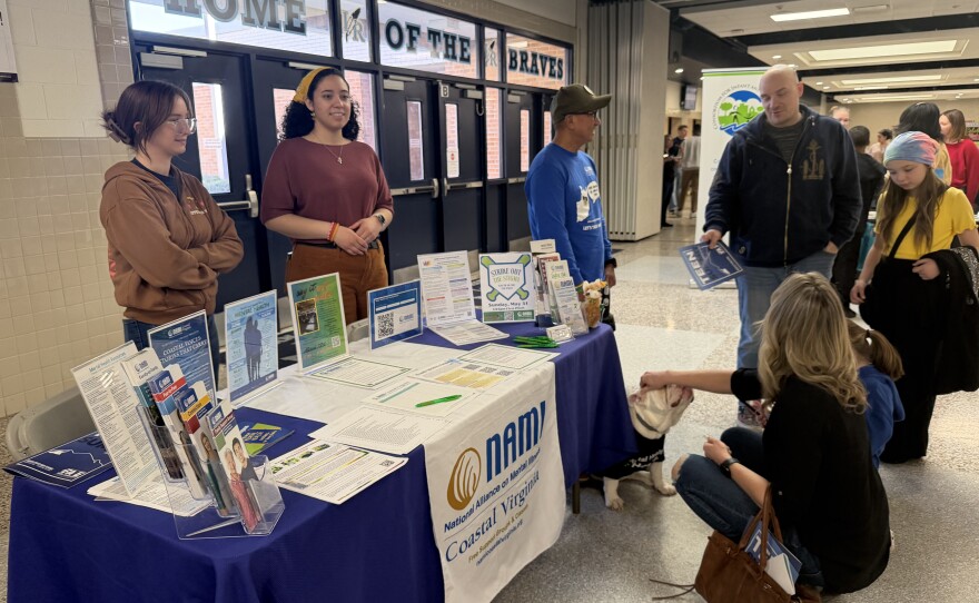 Volunteers with the National Alliance on Mental Illness, Coastal Virginia, staffed a resource table at a recent community event.
