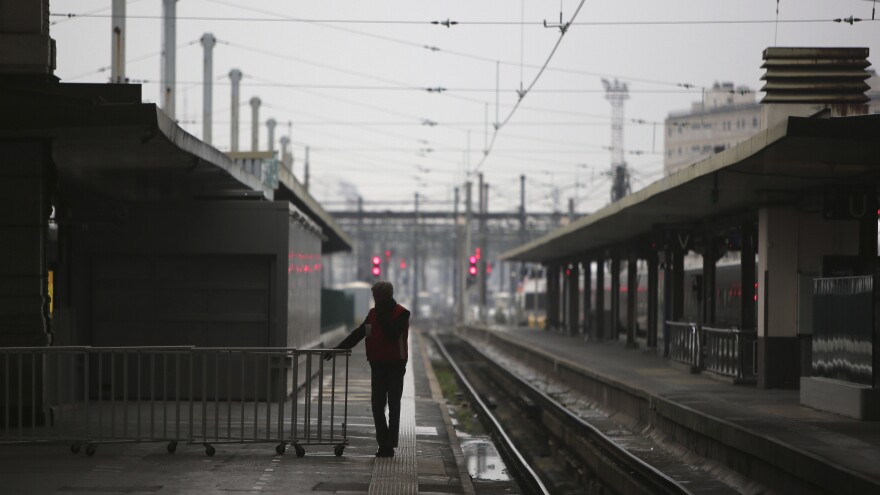 The Gare de Lyon railway station in Paris, typically brimming with busy travelers, stands empty Friday as general strikes snarled transportation across France for a second day.