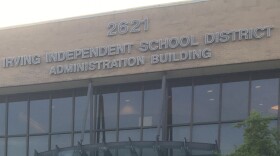 Front of glass and brick building