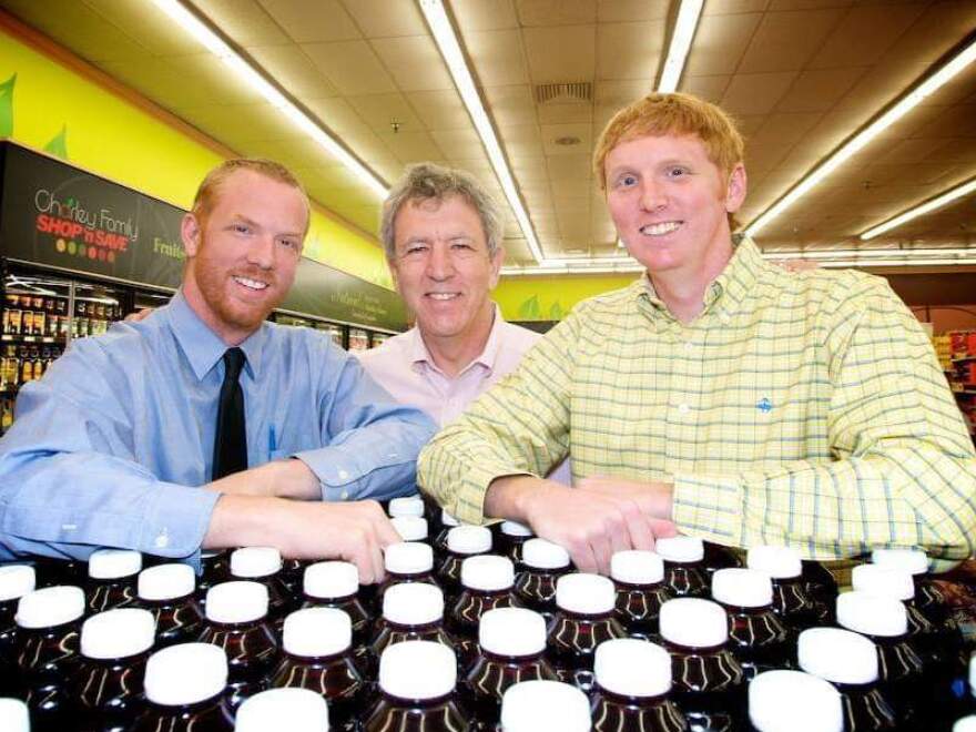 Tom Charley (left) and his family run three Shop N Save supermarkets outside Pittsburgh. Their establishments pride themselves on in-store butchers and bakeries. But these days, their weekly newspaper ads are more likely to feature discount items than high-end steaks.