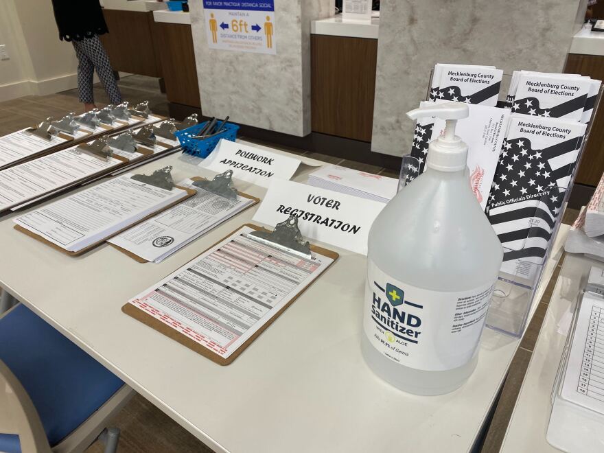 Application forms and hand sanitizer at the Mecklenburg County Board of Elections on Kenilworth Avenue.