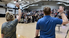 A prayer vigil is held at Henryetta High School on Monday, May 1, 2023.