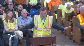 Hammond Mayor Tom McDermott Jr. joined supporters of the Governors Parkway project in wearing a safety vest during the Feb. 10 city council meeting.