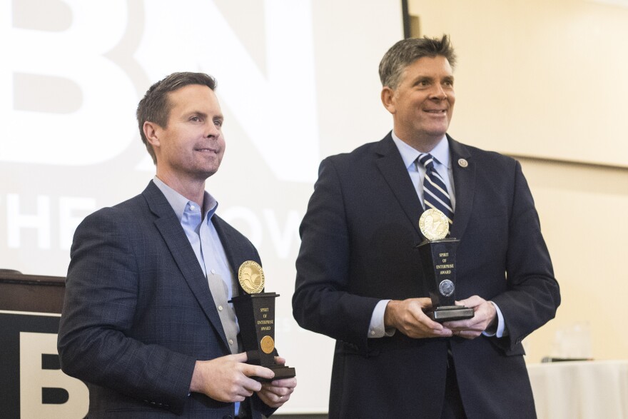 Davis and LaHood answer questions with a crowd