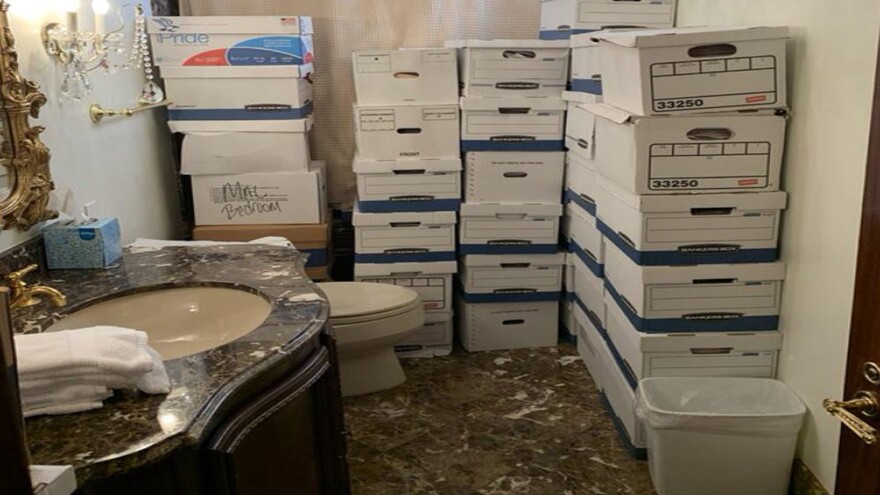 This image, contained in the indictment against former President Donald Trump, shows boxes of records stored in a bathroom and shower at Trump's Mar-a-Lago estate in Palm Beach.
