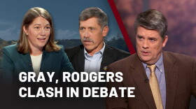 Video thumbnail with three people and text "Gray, Rodgers clash in debate"
