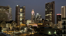 The Ohio Statehouse sits in the center of downtown Columbus, with the Riffe State Office Tower to the left, and the Rhodes State Office Tower to the right.