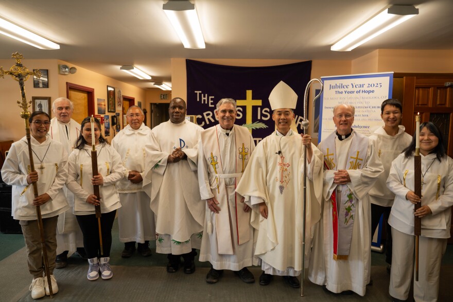 Clergy gather at the Immaculate Conception Catholic Church