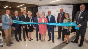 Health care leaders at the ribbon cutting for a new medical tower