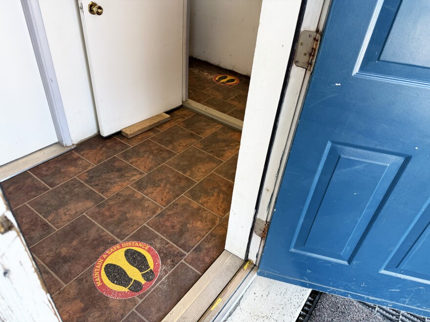 Stickers advise people to social distance inside Seldovia's municipal building on Wednesday, June 11, 2025 in Seldovia, Alaska.