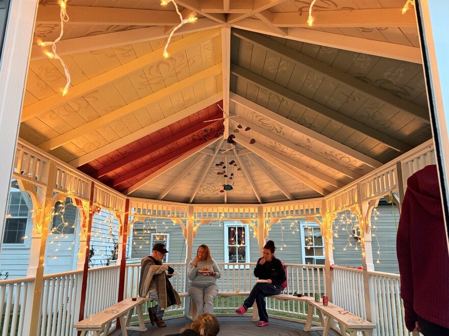 The new gazebo beside Fresh Start is painted with warm colors and features a lotus-themed chandelier hanging from the ceiling.