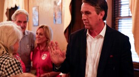 Republican candidate for U.S. Senate Barry Moore greets guest at his watch party at the Rawls Hotel, Tuesday, June 16, 2026, in Enterprise, Ala (AP Photo/Butch Dill)