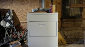 A washing machine in a basement