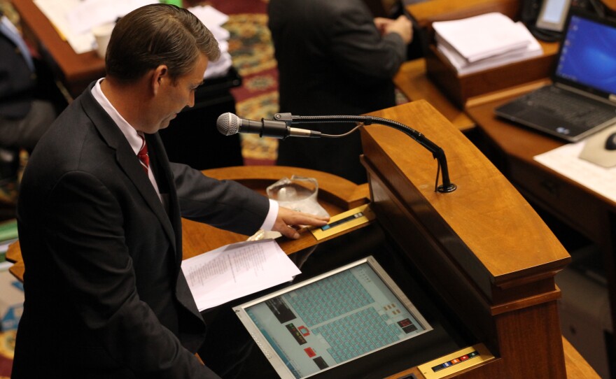 Richardson examines a computerized seating chart.