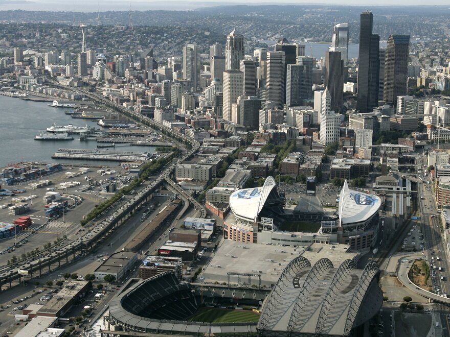 The Alaskan Way Viaduct, the raised two-level highway that runs along Seattle's downtown waterfront, is seen from the air in 2006. Seattle is now replacing it to improve mobility for people and goods.