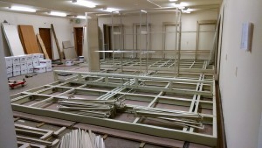 Shelf parts waiting to be assembled. (Helen Alten)