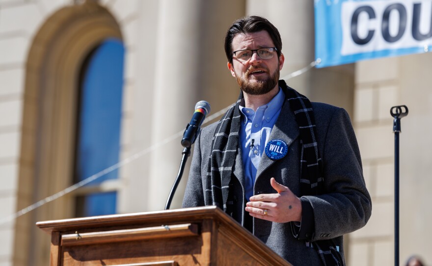 Democratic U.S. House candidate William Lawrence speaks at a No Kings rally at the Michigan Capitol in Lansing, Mich., on March 28, 2026.