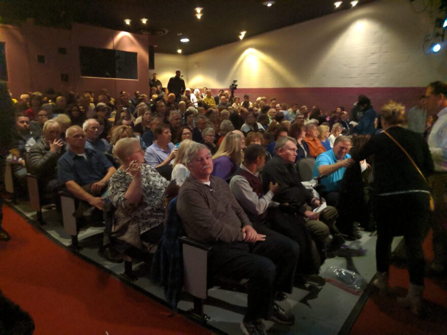 An estimate 300 people gathered in SUNY Broome’s Angelo Zuccolo Little Theatre and a nearby cafeteria for the event. Photo by Charles Compton/WSKG News